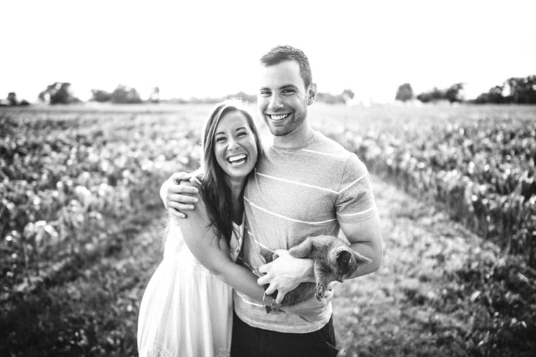 happy couple in field.jpg