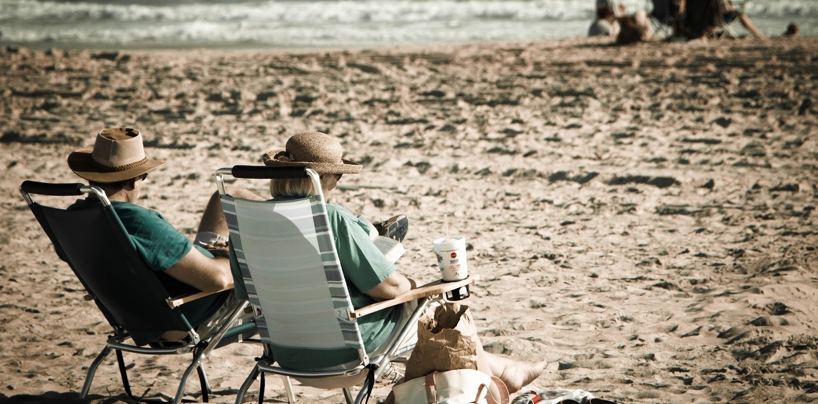 An_old_couple_relaxing_on_the_beach-486446-edited.jpg